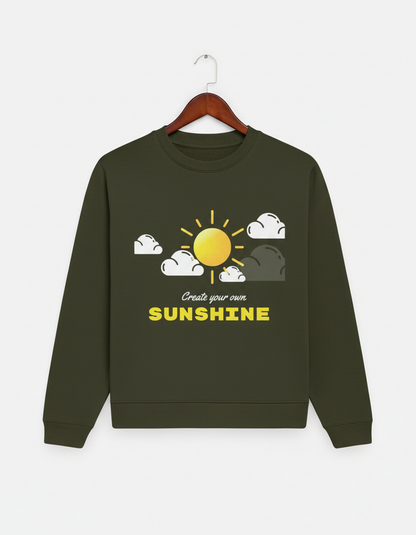 Dark green sweatshirt with yellow sun and white clouds graphic and text "Create your own SUNSHINE"